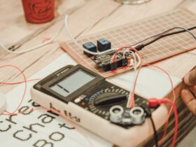 person uses white multimeter