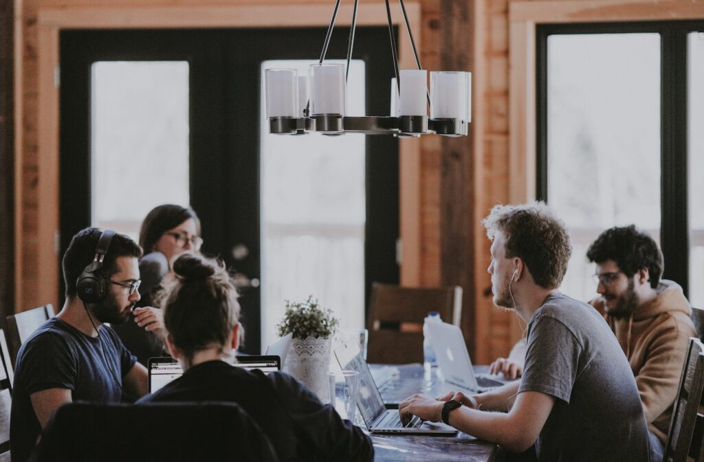 A team of people discussing professional services automation.