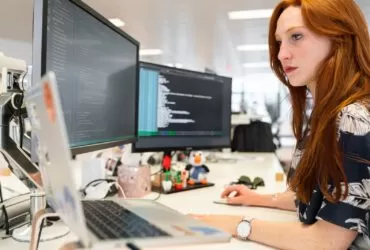 Woman Coding on Computer