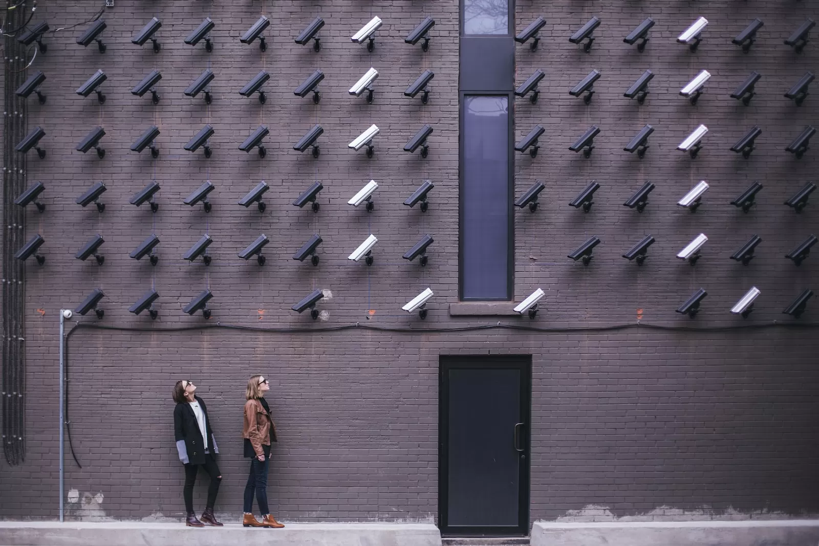 two women facing Cloud IP Camera 