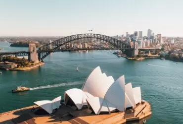 sydney opera house near body of water during daytime