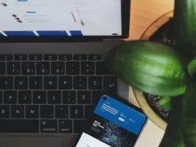 blue and white visa card on black and gray laptop computer