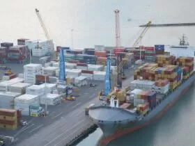 cargo ship on dock during daytime