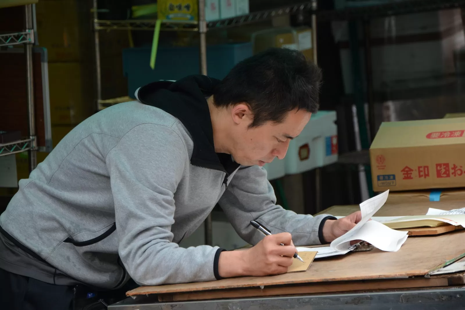 man in gray hoodie accounting audit